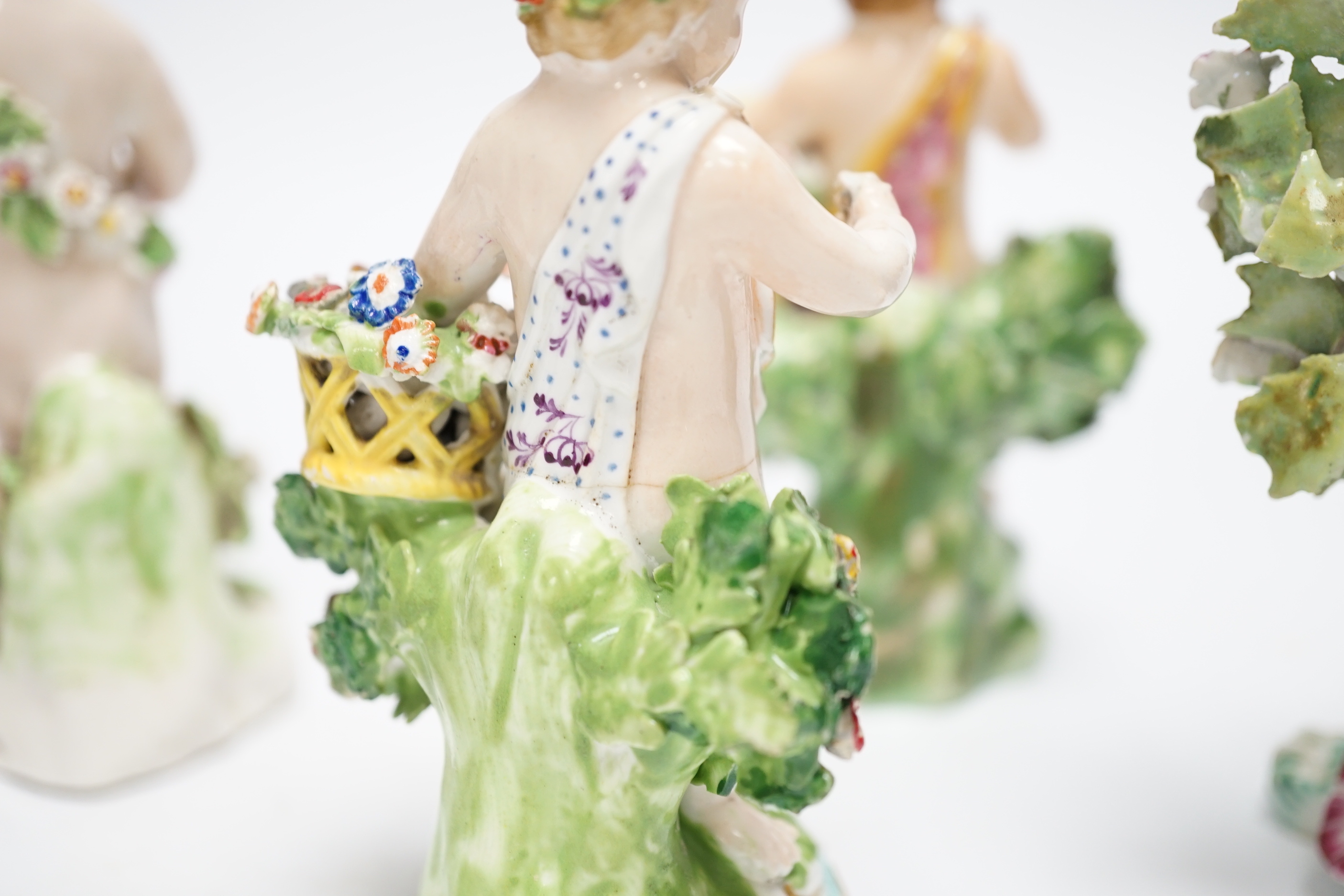 Six 18th/19th century figures by Bow and Derby, including a flower encrusted Bow figure with bocage, 15cm